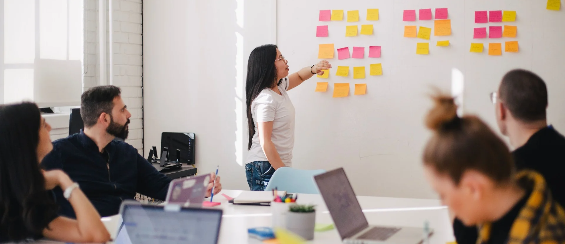 Team Working with Post It Notes